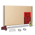 En papkasse mærket "Comandante RX35 Red Clix opgradering" med et rødt logo sidder bag forskellige mekaniske dele: et rødt stjernestykke, fjeder, metalstang, to skiver og et cylindrisk leje. Perfekt til kaffeentusiaster, der søger præcision, der er kompatibel med RX35 Combo.