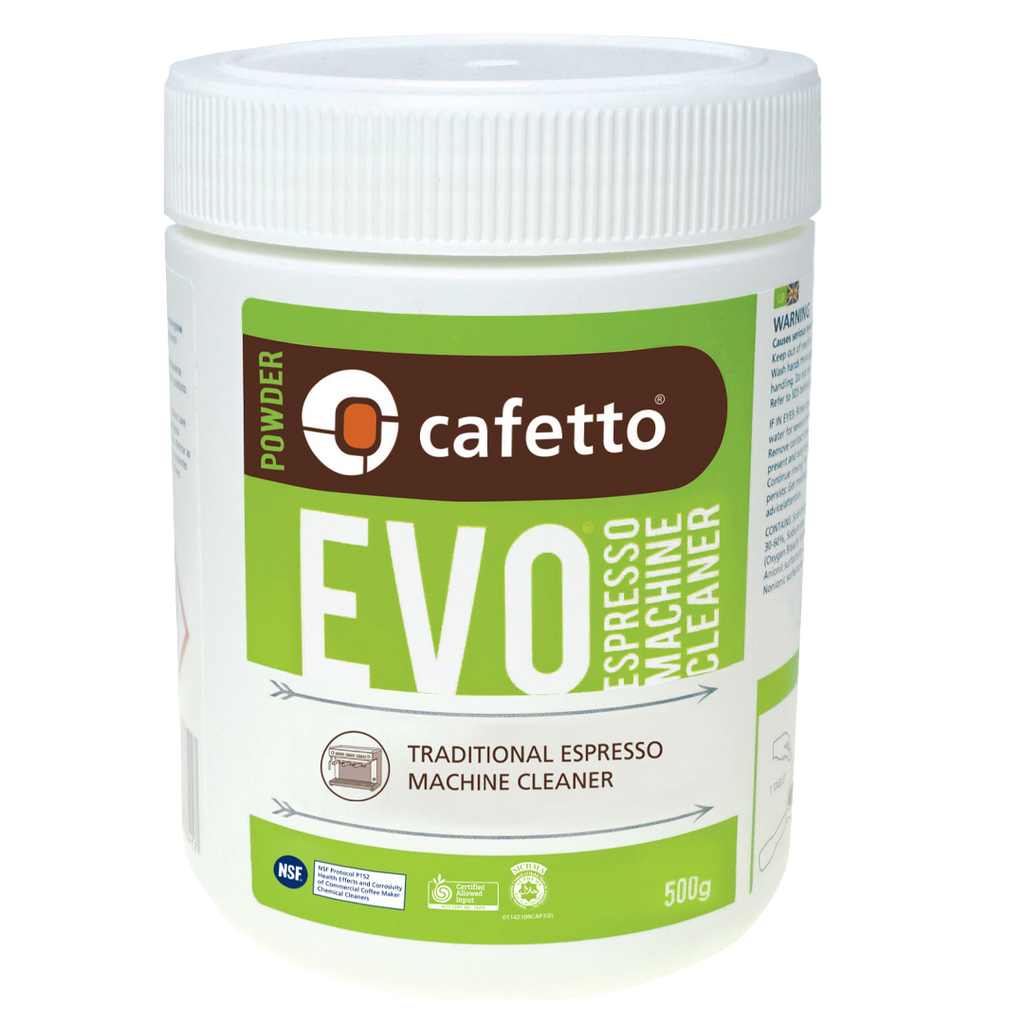 En rund hvid plastikbeholder med en grøn og hvid etiket læser "Cafetto EVO Cleaning Powder, 500g." Dette miljøvenlige produkt er ideelt til vedligeholdelse af halvautomatiske espressomaskiner og har et skruelåg.